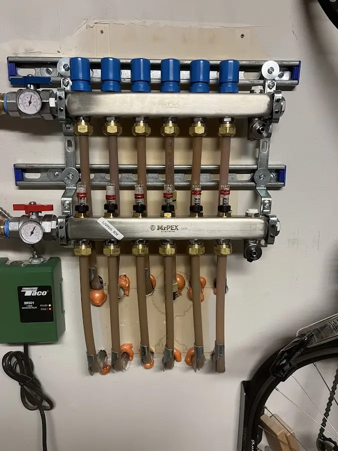 Plumber performing Gas Line Installation at a residential property in Sunnyside